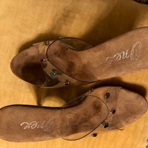 A PAIR OF VINTAGE CLEAR HEELS